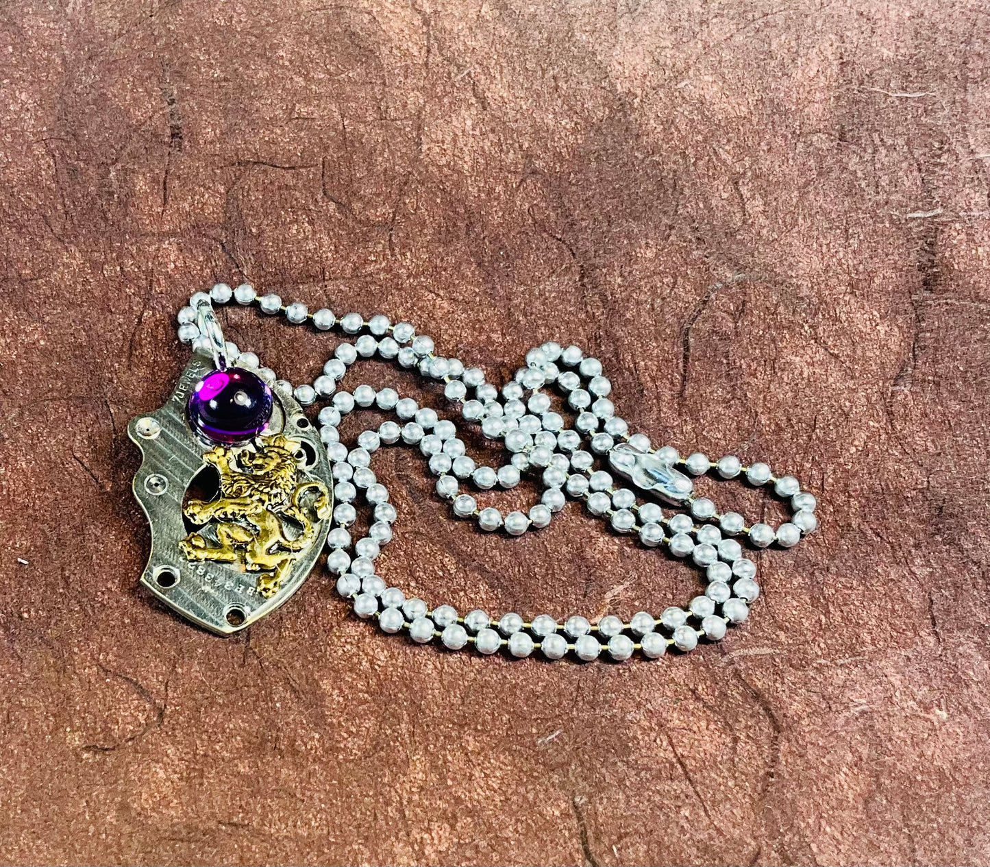 pocket watch and royal lion necklace with purple stone