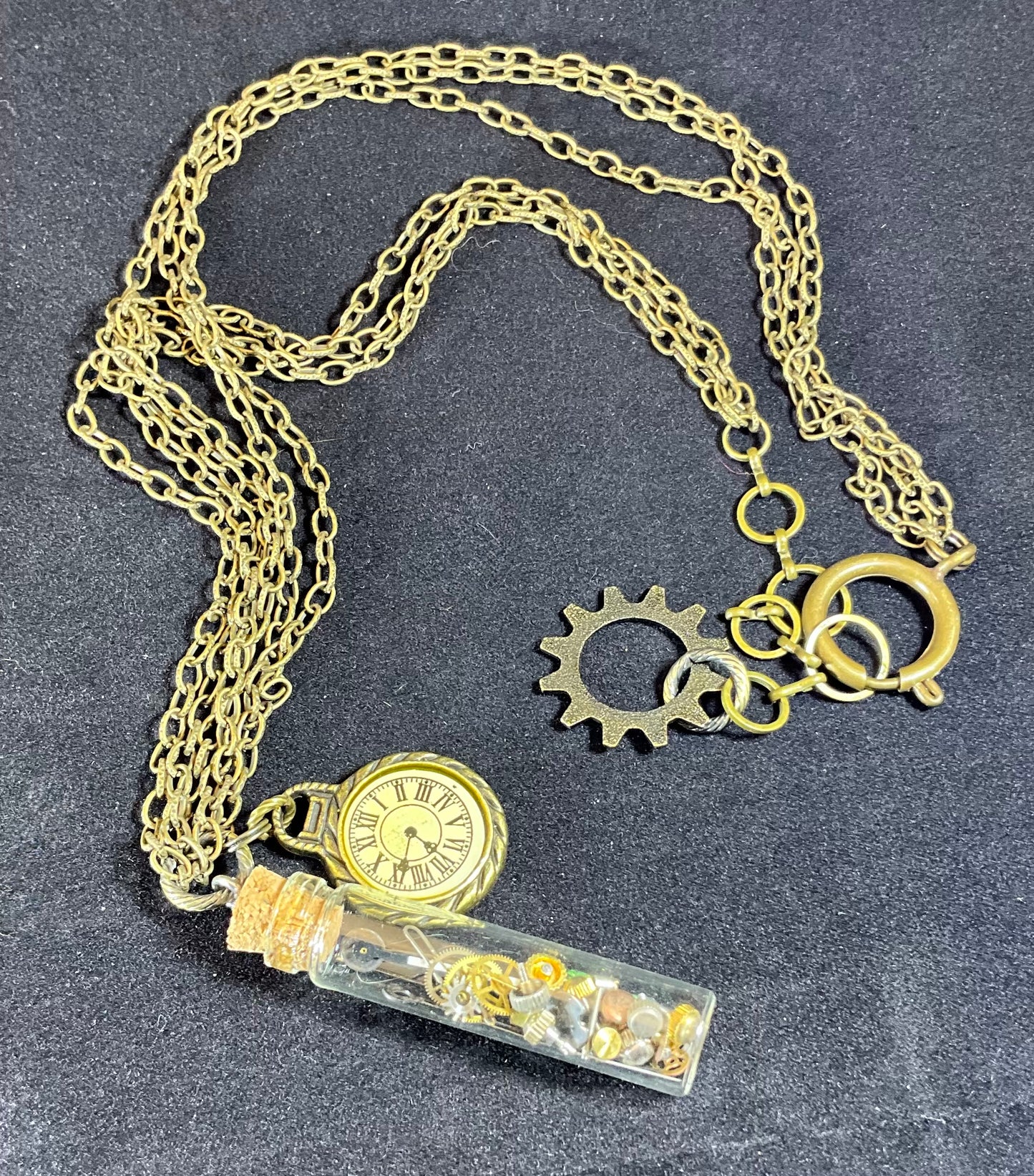 watch parts in a bottle necklace