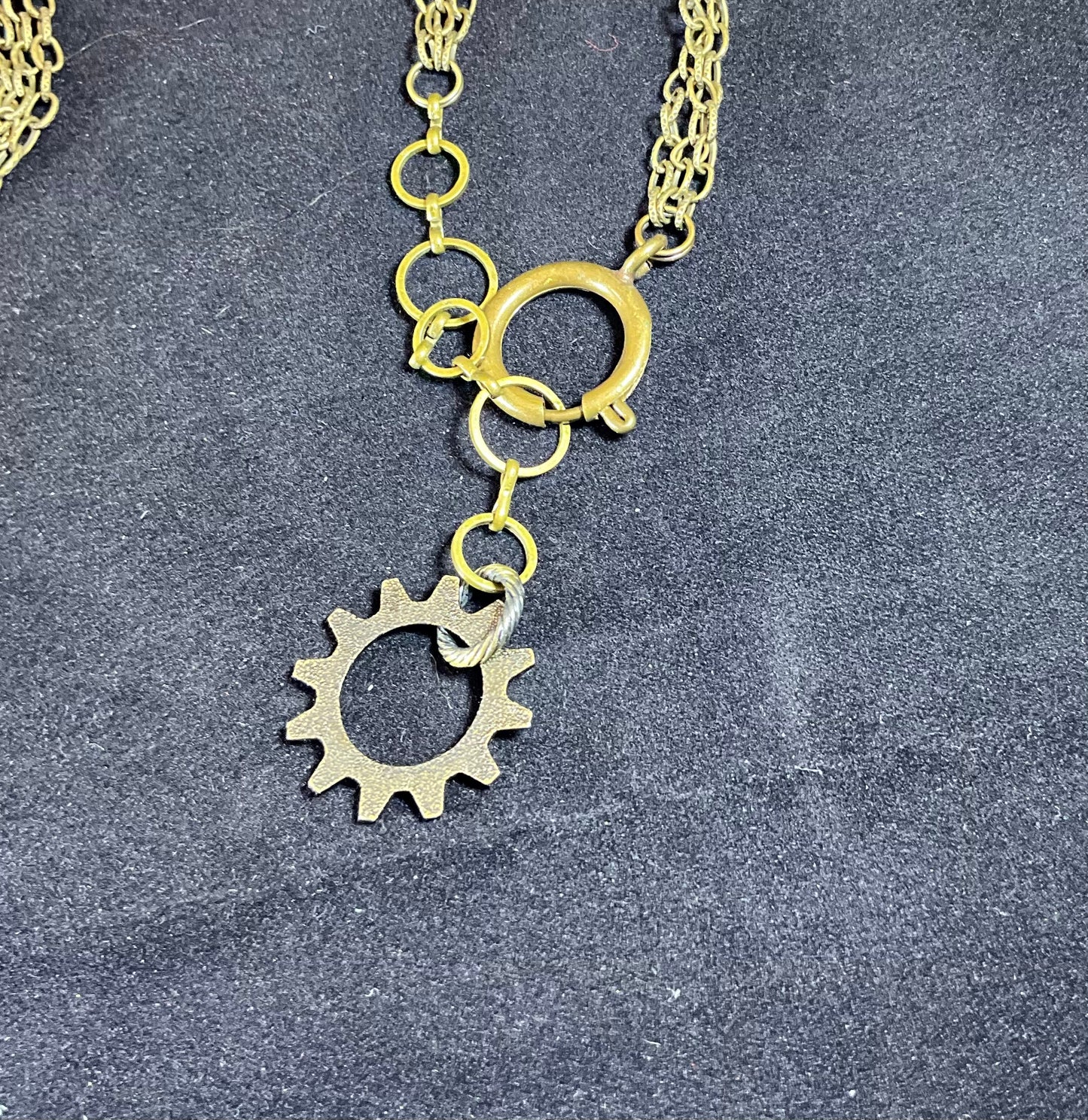 watch parts in a bottle necklace
