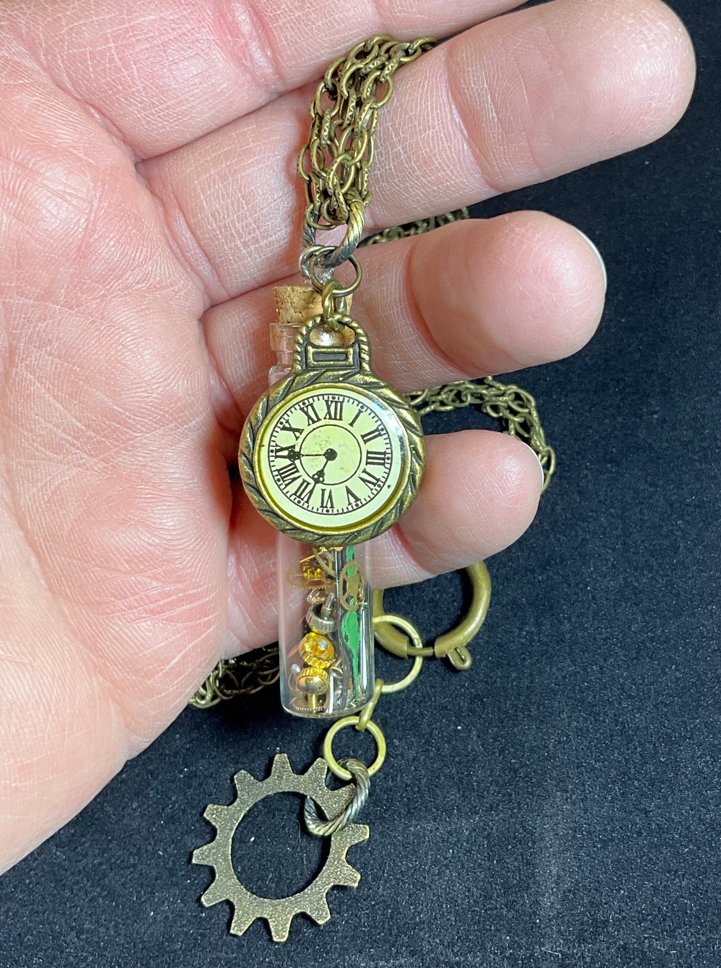 watch parts in a bottle necklace