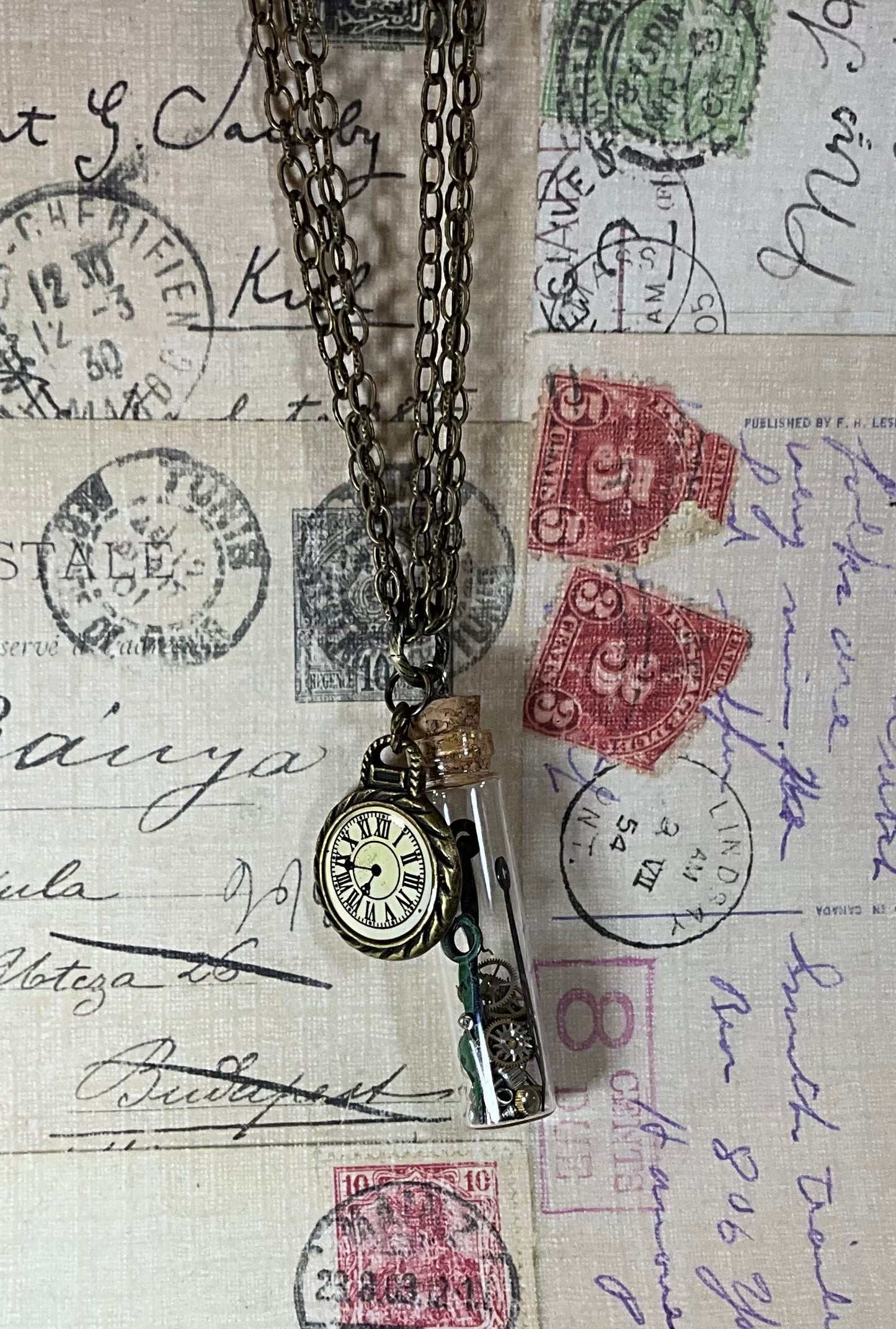 watch parts in a bottle necklace