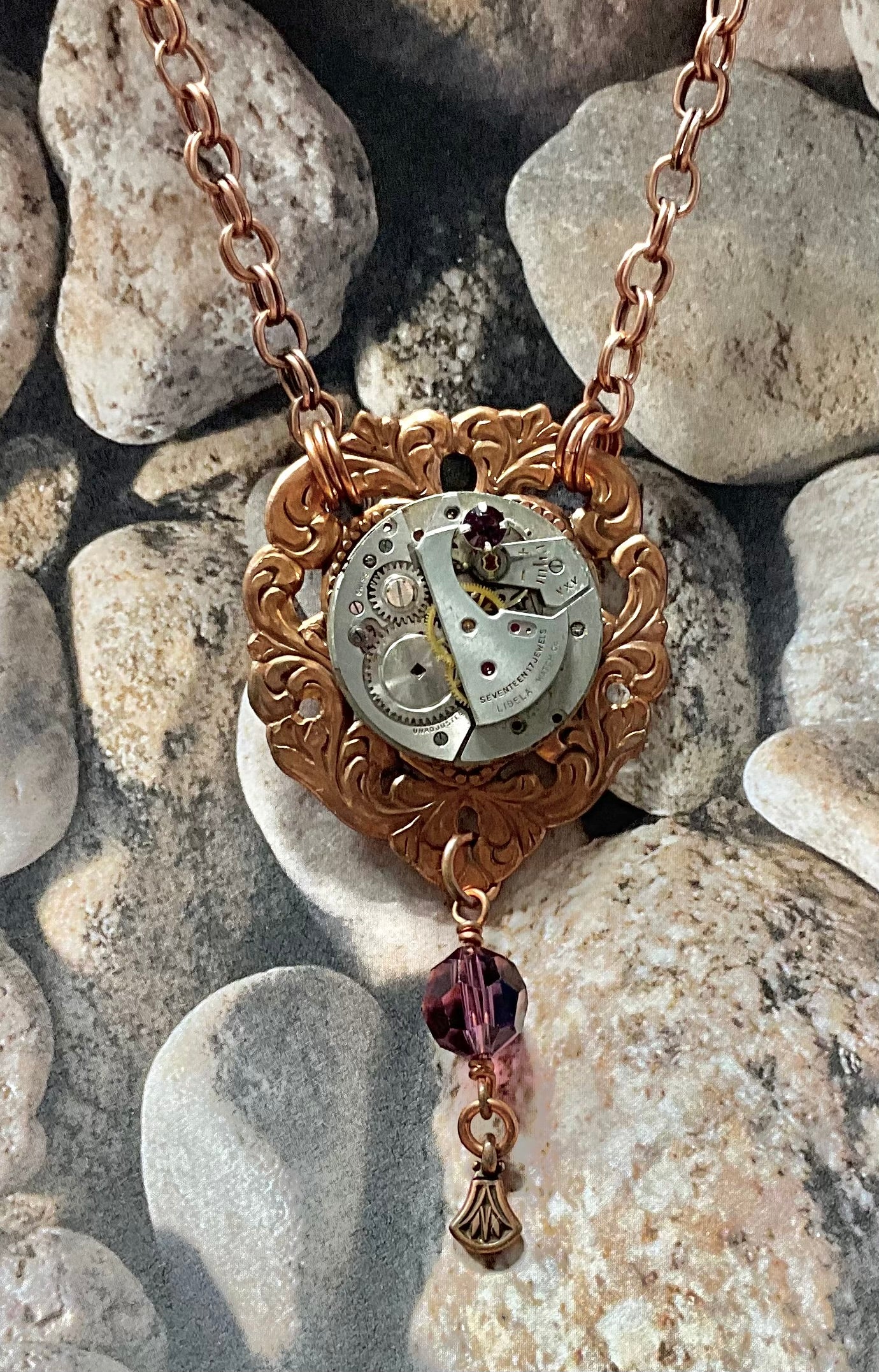 copper necklace with vintage watch and purple crystals