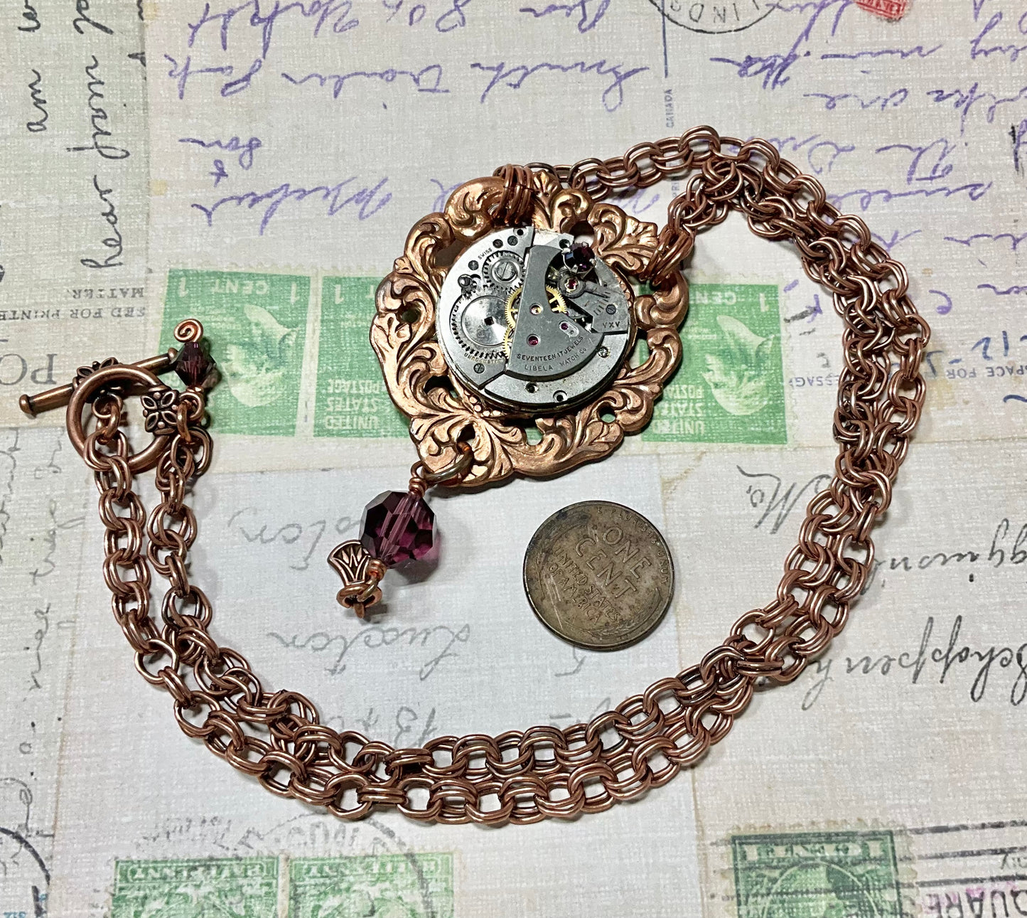 copper necklace with vintage watch and purple crystals