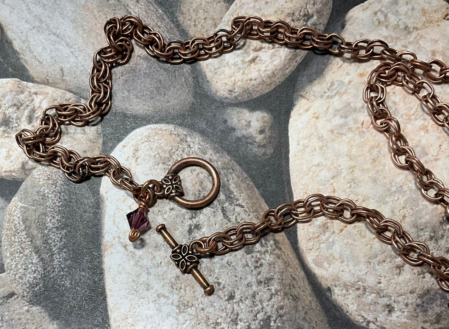 copper necklace with vintage watch and purple crystals