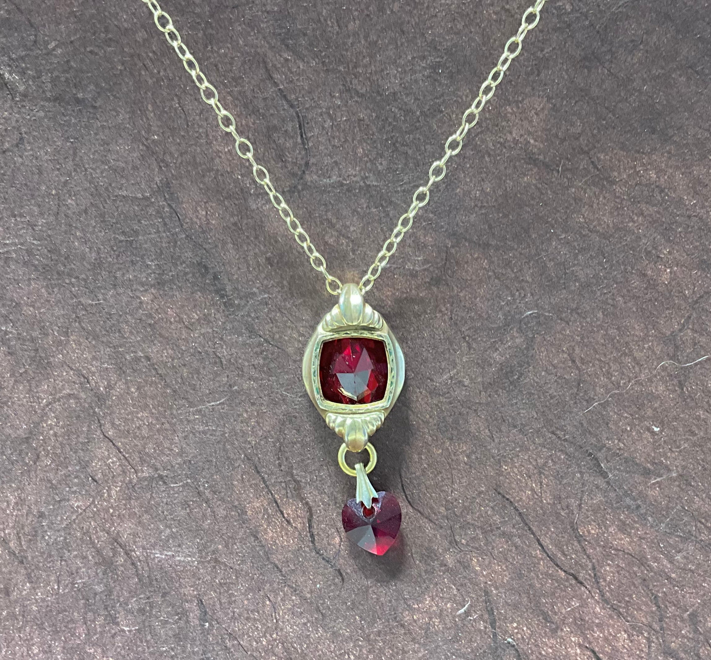 vintage fold filled watch case and red crystal heart necklace