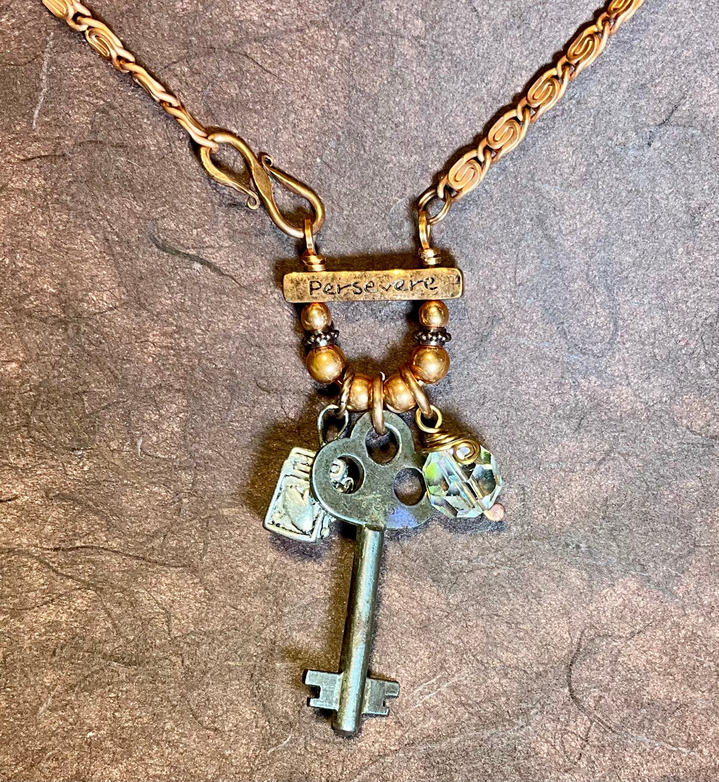 key prayer box crystal Persevere necklace in copper
