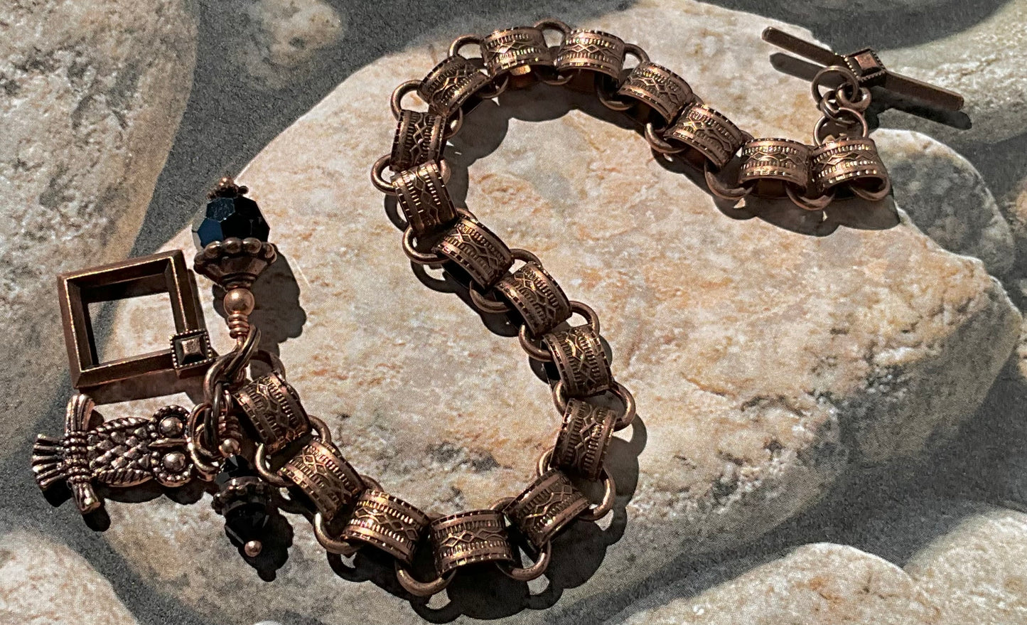 book chain bracelet with owl and black crystal charms