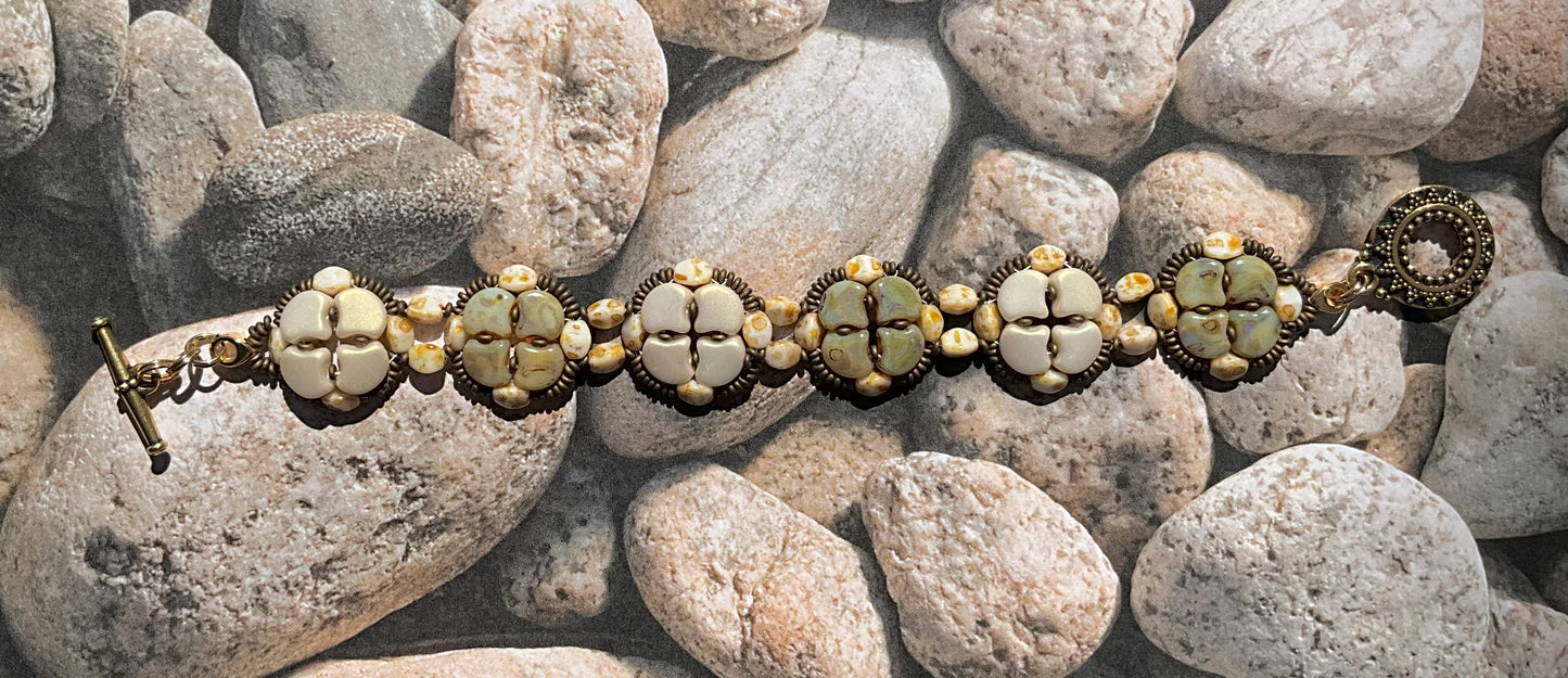 woven beaded bracelet in neutrals - beige, brown and gold