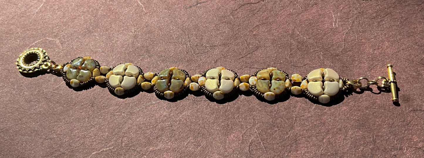 woven beaded bracelet in neutrals - beige, brown and gold