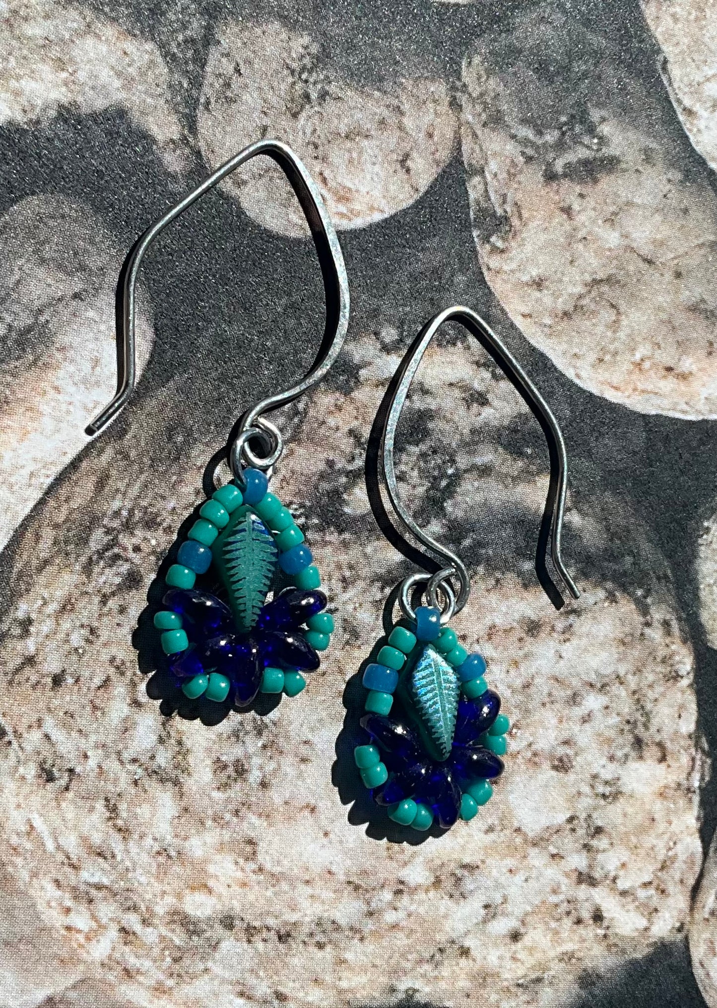 teal and cobalt blue woven leaf earrings