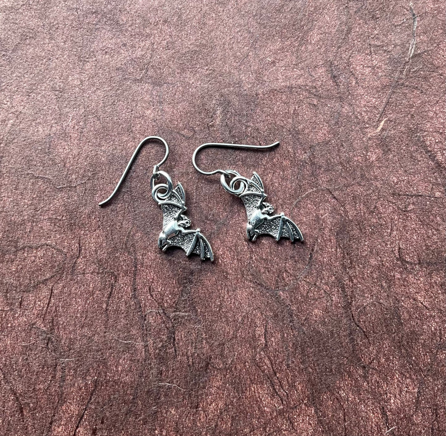 silvertoned bat earrings