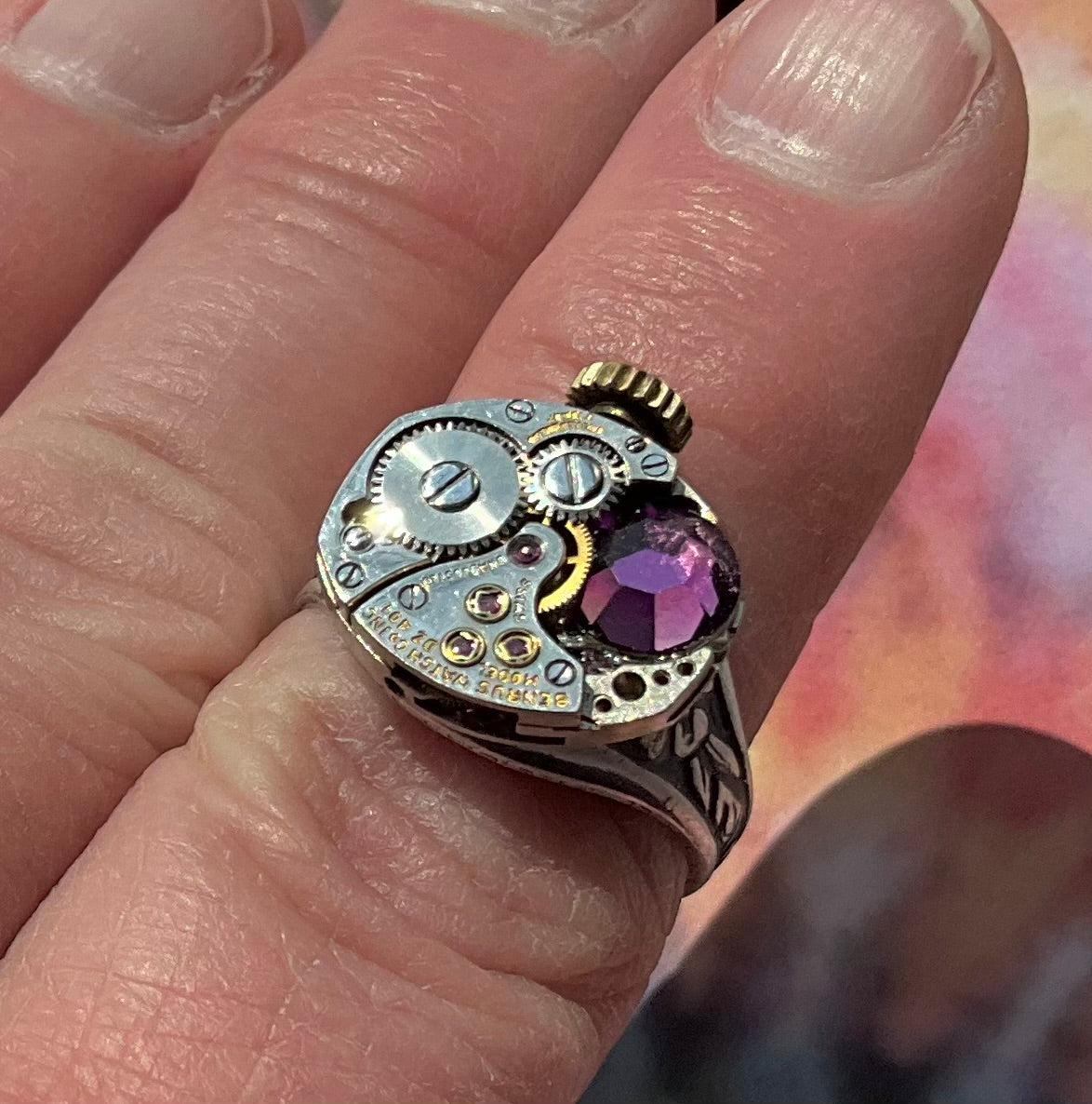 vintage watch movement ring with purple crystal