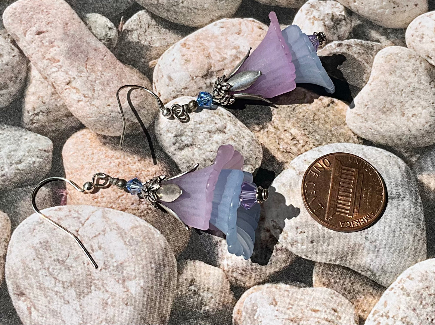layered blue and purple flower earrings