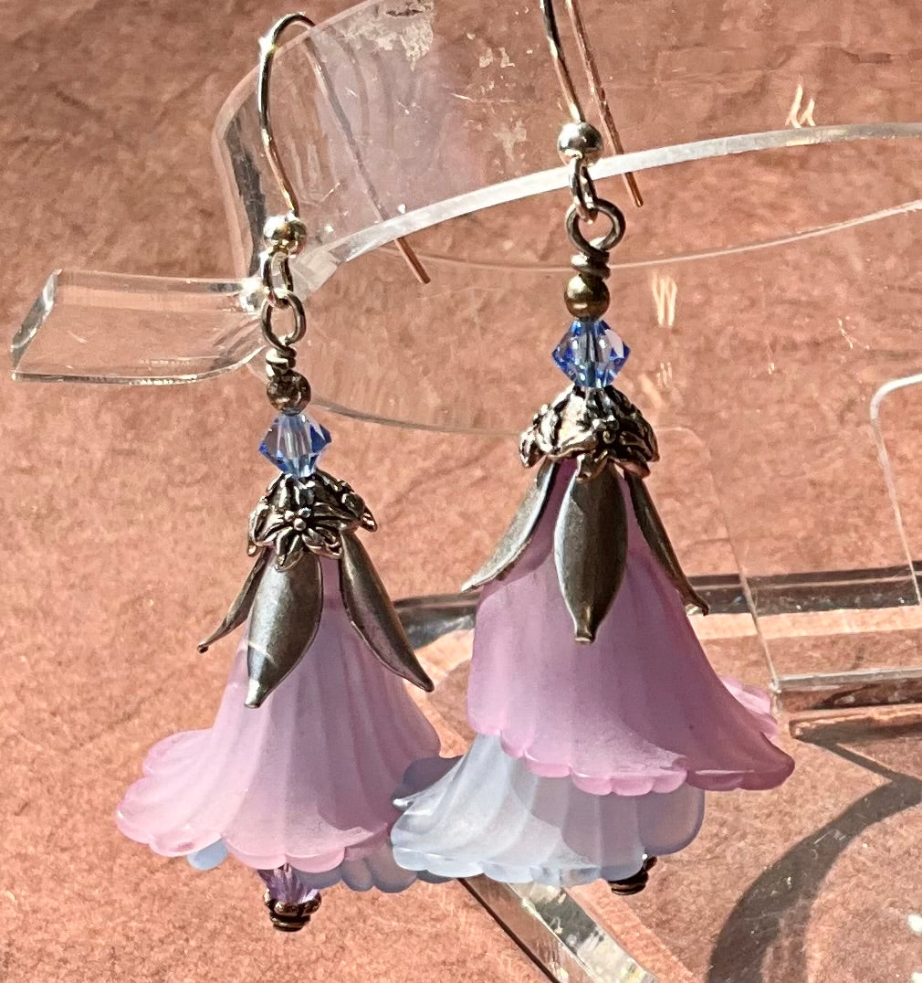layered blue and purple flower earrings