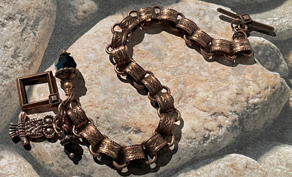 book chain bracelet with owl and black crystal charms