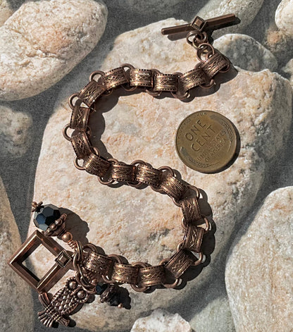 book chain bracelet with owl and black crystal charms