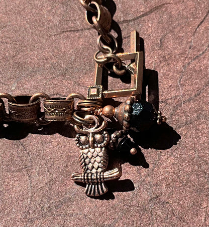 book chain bracelet with owl and black crystal charms
